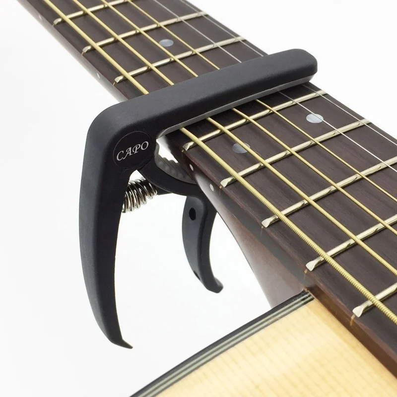 Capotasto per chitarra in plas - Musical Instrument With Strings recensione e prezzo