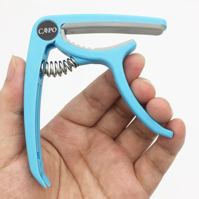 Capotasto per chitarra in plas - Musical Instrument With Strings recensione e prezzo